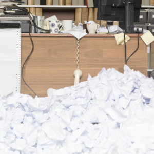 Office with wads of paper overflowing