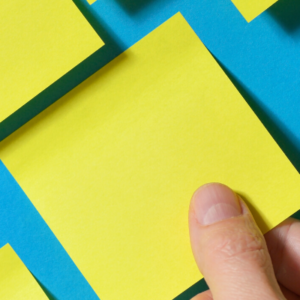Several yellow sticky notes on a blue background