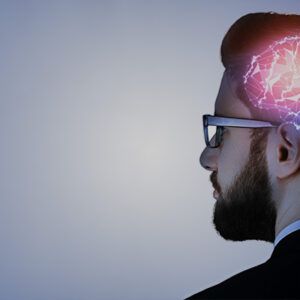 Man in glasses with a animated brain superimposed onto their head
