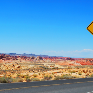 Desert with road sign