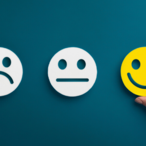 Three different cut outs of smiley faces with different expressions