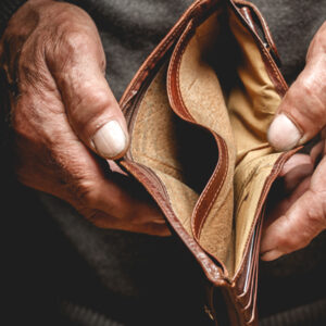 Person displaying an open faced empty wallet