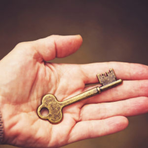 Person holding a key